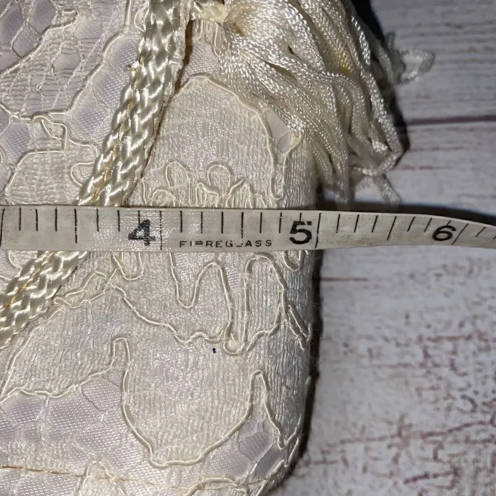 La Regale LTD vintage lace clutch w/nylon chord strap & fringe tassle white